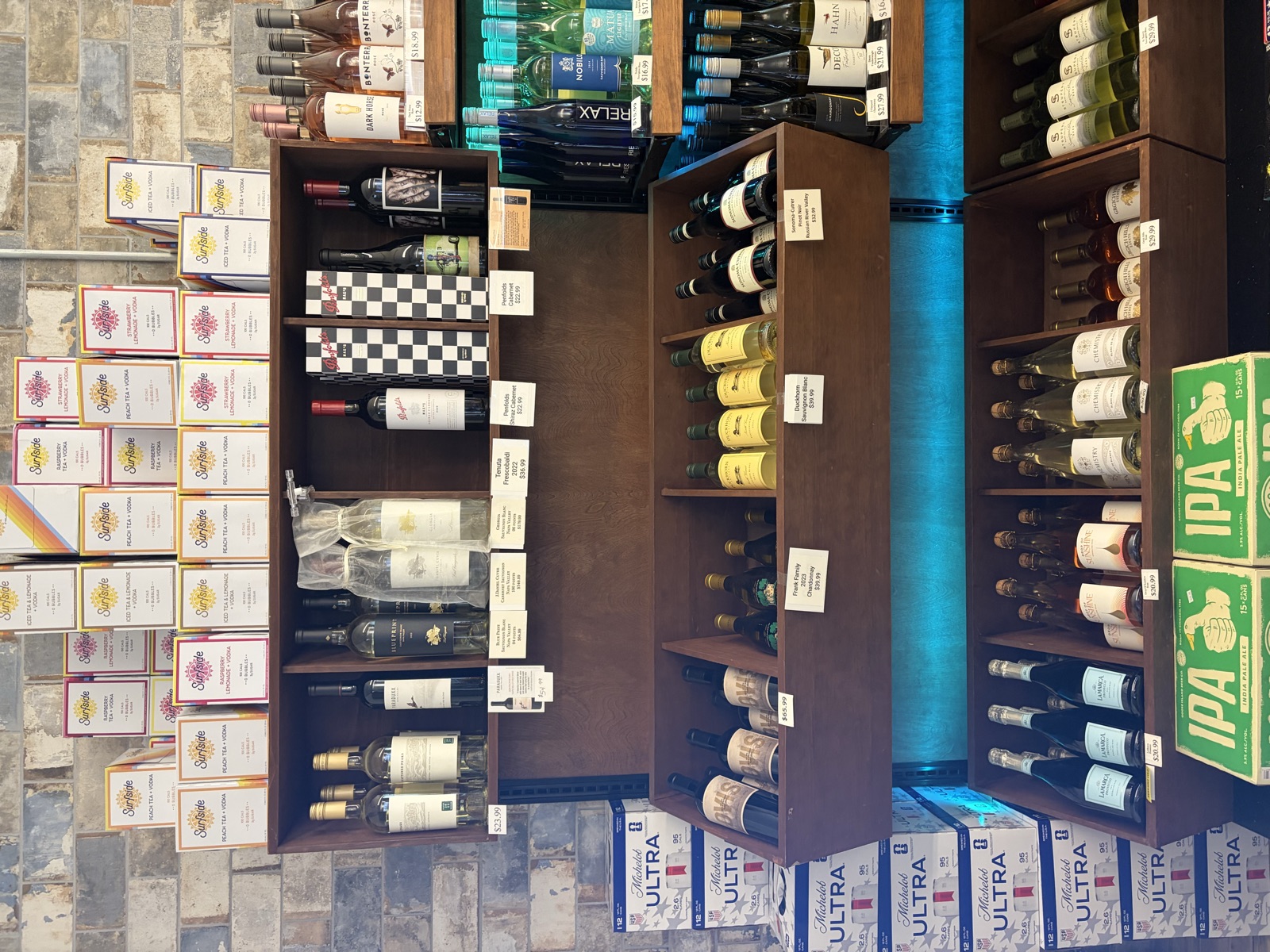 Wine display and boxed selections inside The Island Shoppe