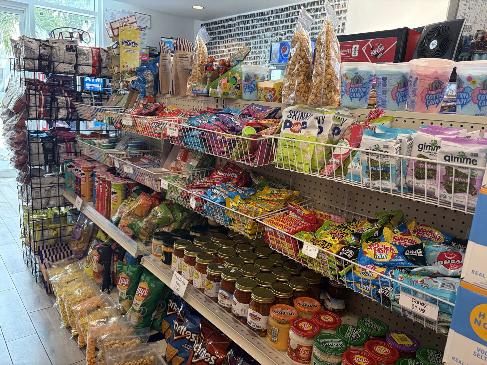 Snack aisle with chips, candy, and grab-and-go items at The Island Shoppe