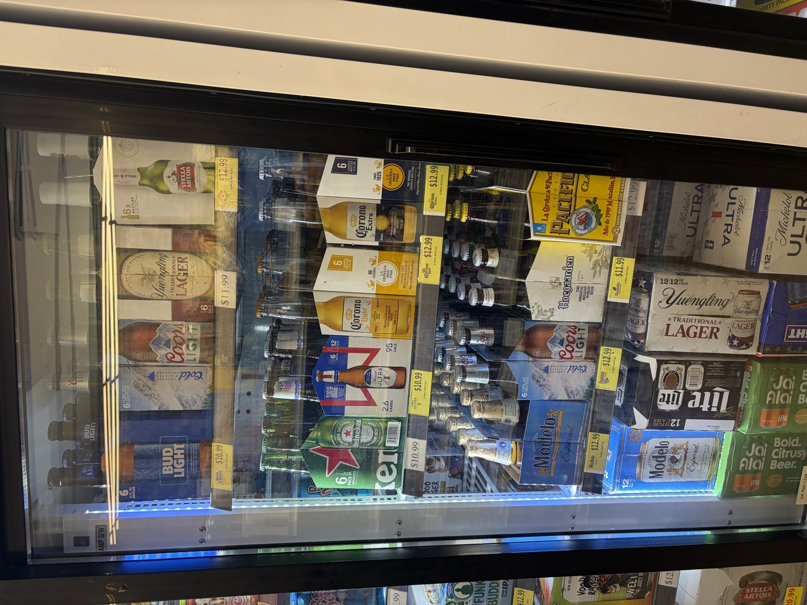 Cooler stocked with juices, coffee drinks, and bottled beverages