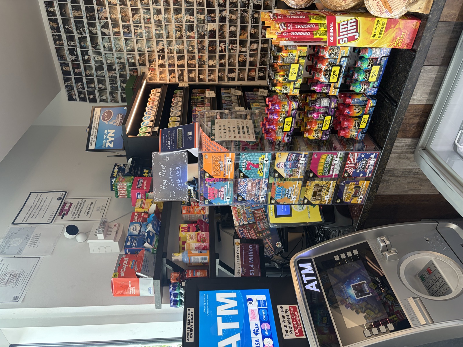 ATM, counter, and candy shelves inside The Island Shoppe