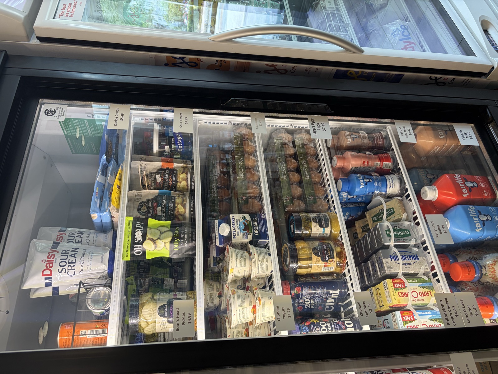 Refrigerated grocery and deli case at The Island Shoppe